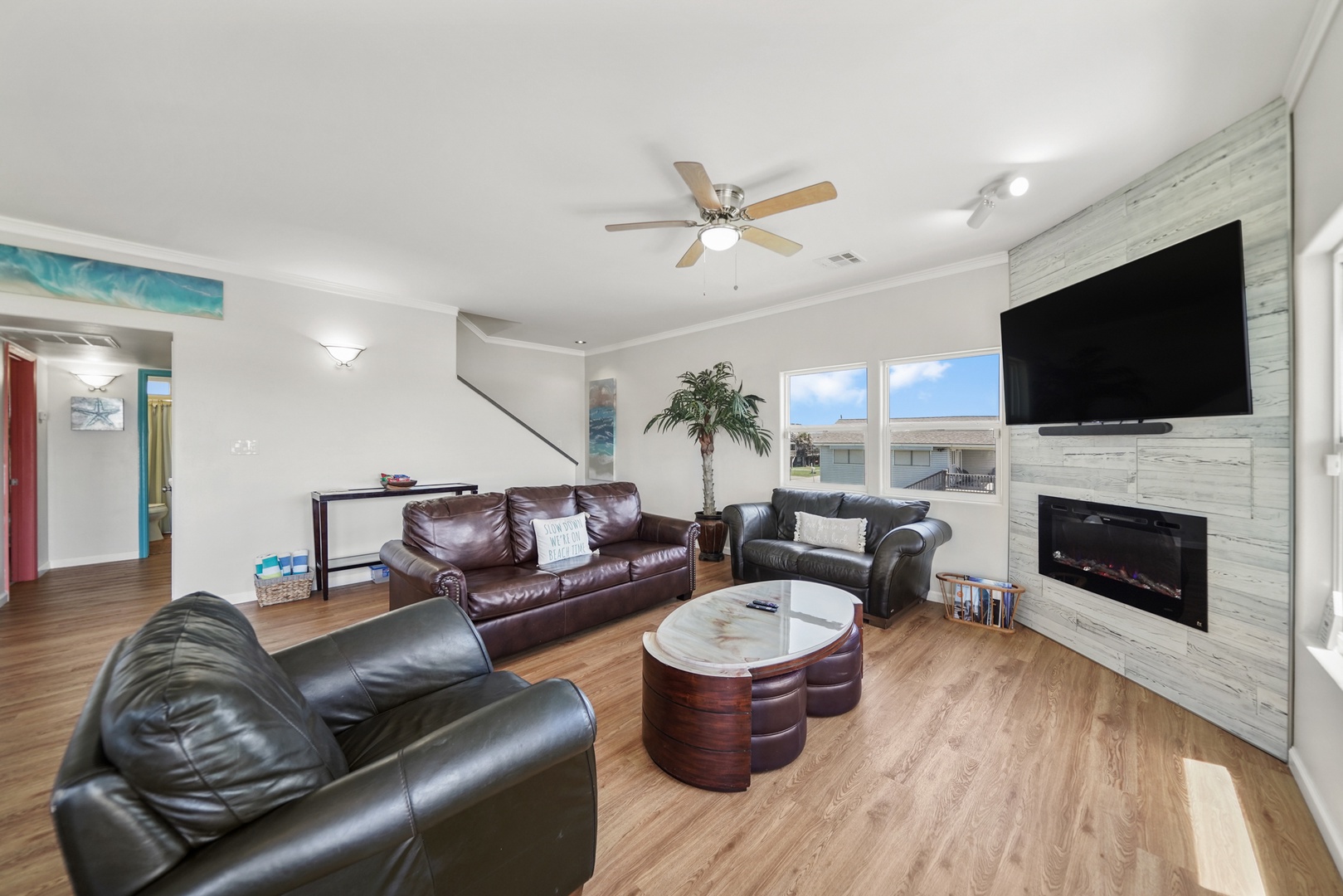 Spacious living room with fireplace & comfort