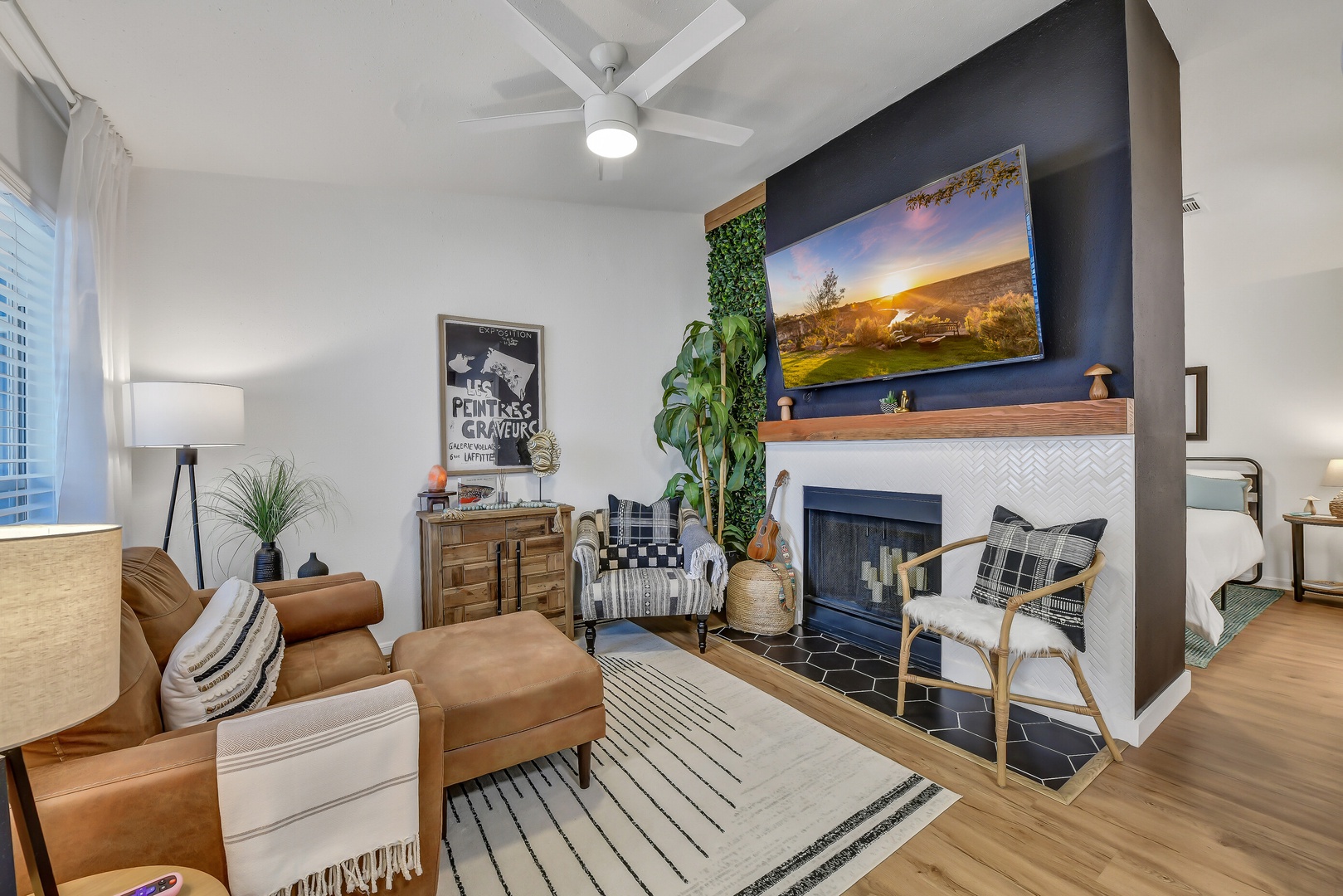 Relax by the fireplace in this comfortable living room