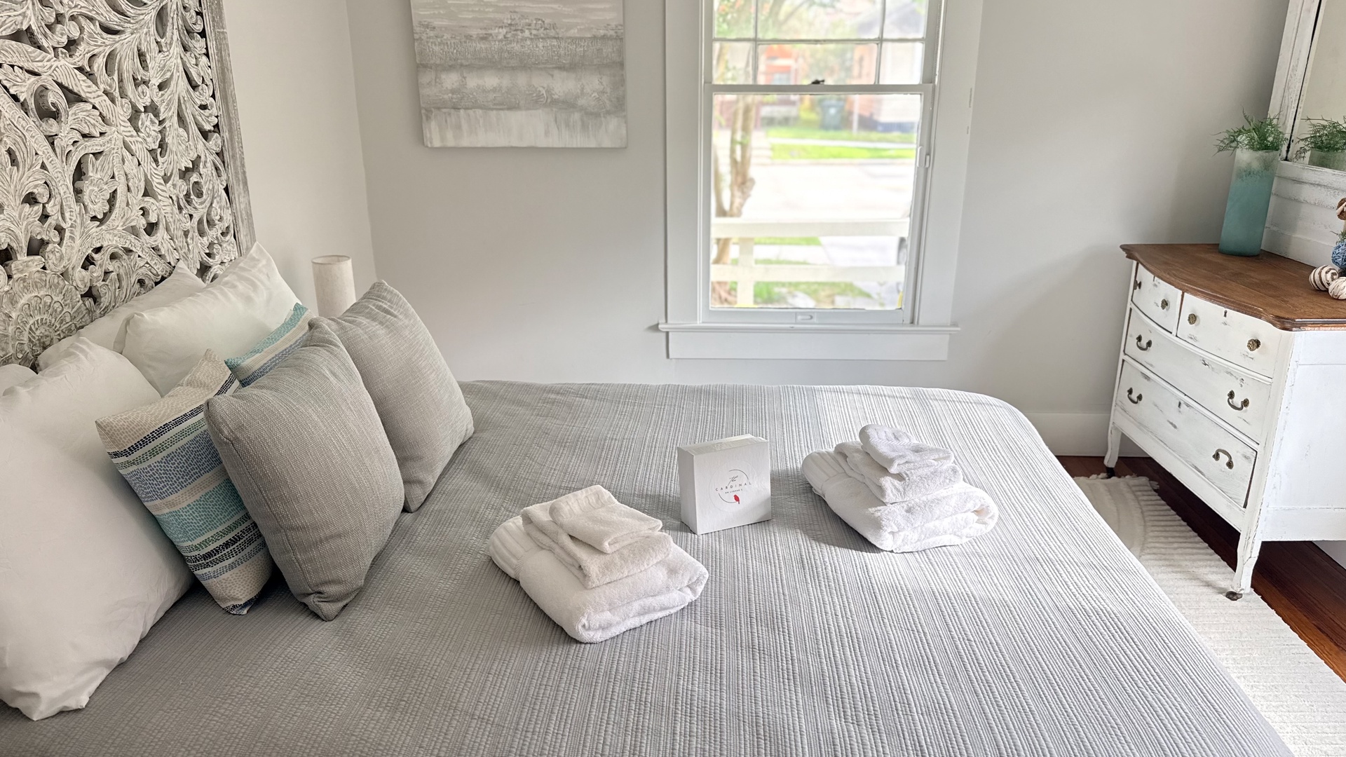 Slip into your peaceful retreat where crisp linens and coastal touches create the perfect backdrop for unwinding after exploring the neighborhood.