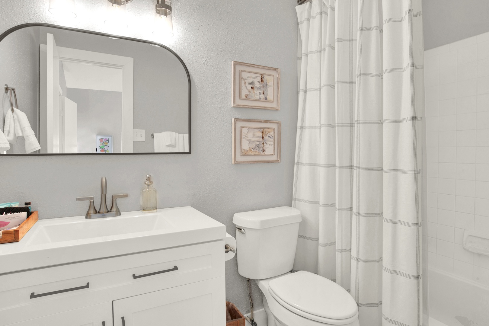 Fresh bathroom with spacious vanity & modern finishes