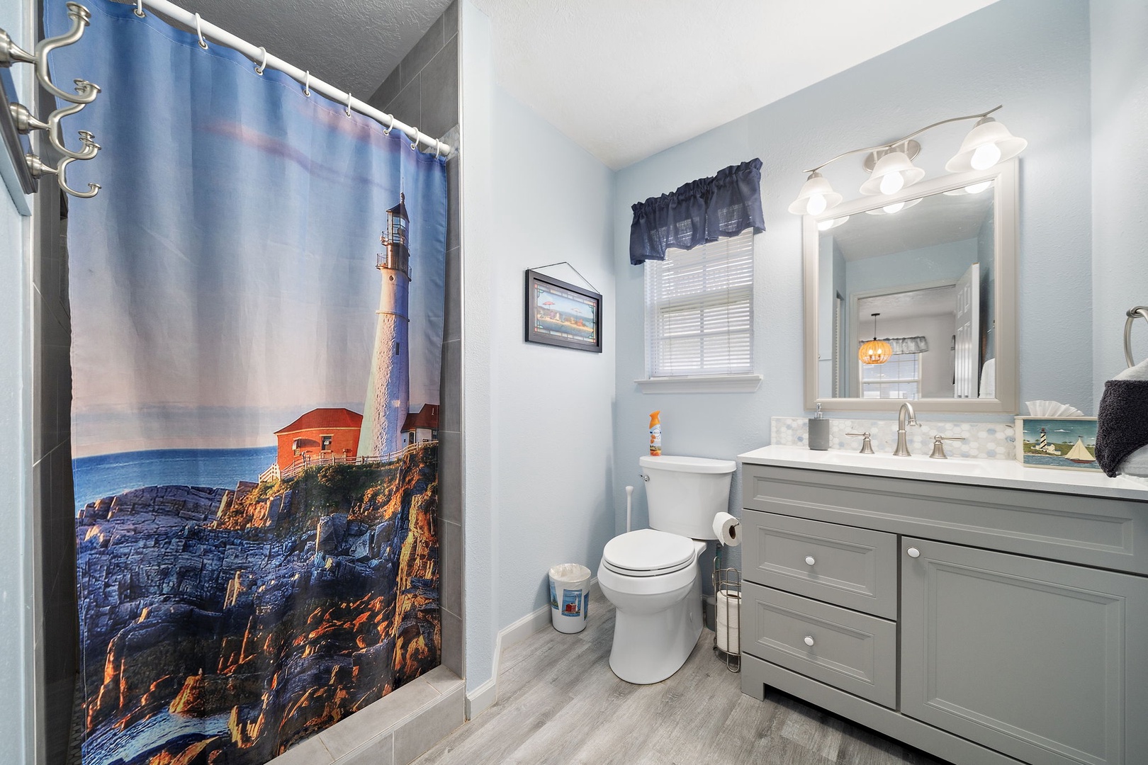 Downstairs full bathroom shared includes all the needed amenities for your stay.