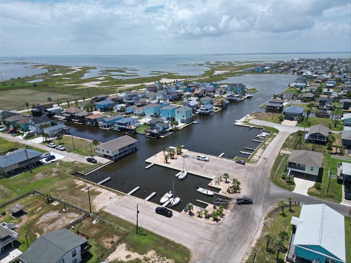 Aerial view of waterfront community with private docks.