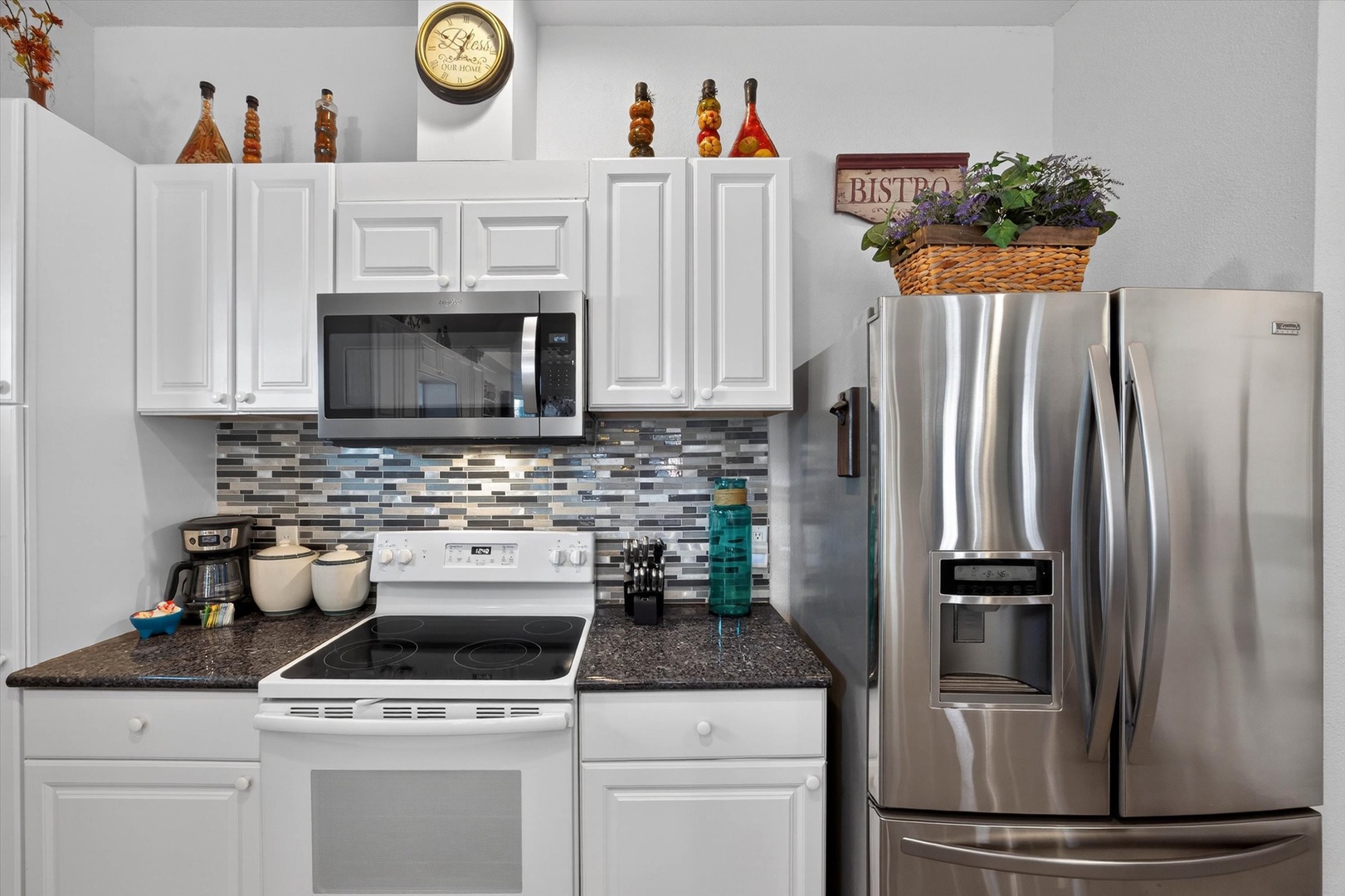 Your fully equipped kitchen awaits with granite countertops, stainless steel appliances, and everything you need to create memorable meals together.