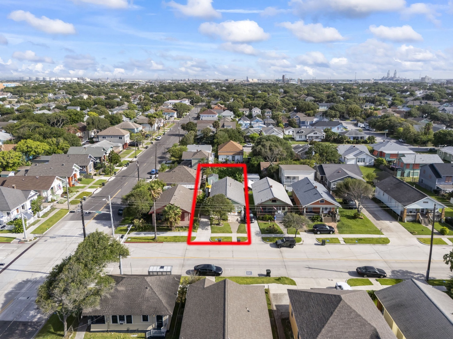 Coastal area with homes near ocean and beach access.