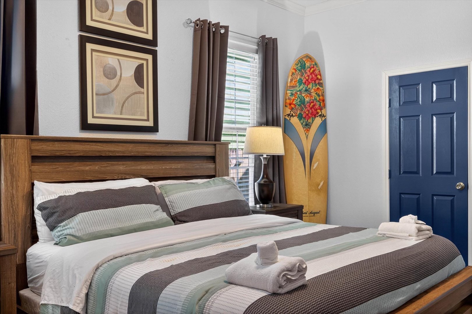 Sink into comfort in your stylishly appointed primary bedroom, with ensuite bath, where coastal charm meets modern convenience for your perfect retreat.