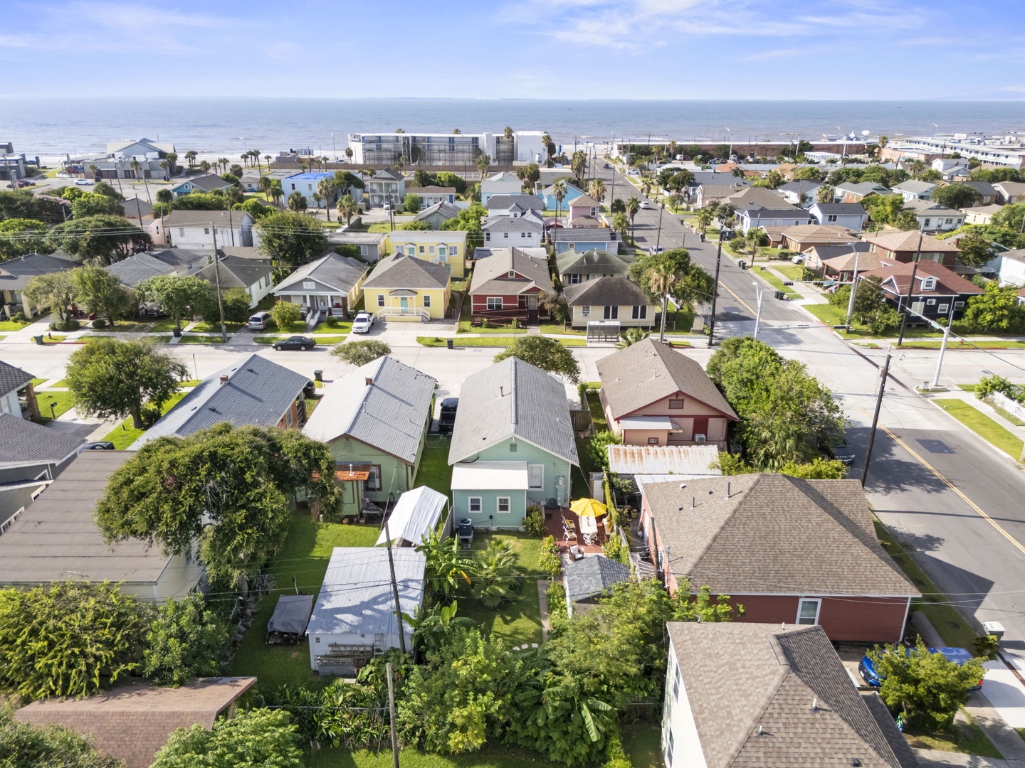 Central neighborhood aerial view, steps from the beach.