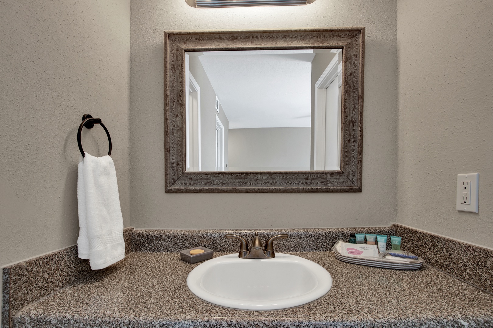 Modern bathroom with thoughtful touches and comfort.