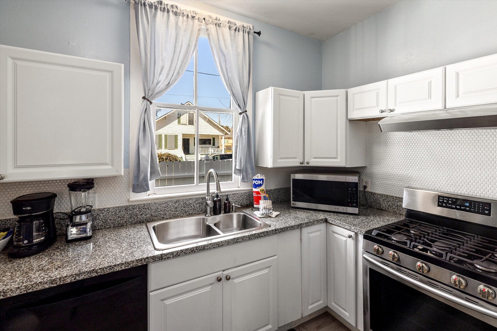 Your fully equipped kitchen features granite countertops, stainless steel appliances, and everything you need to prepare meals during your stay.