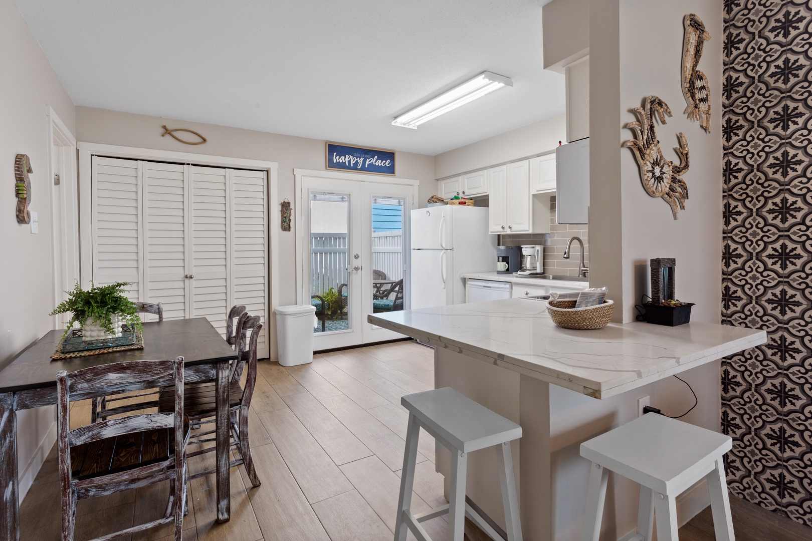 Morning coffee starts in this coastal kitchen