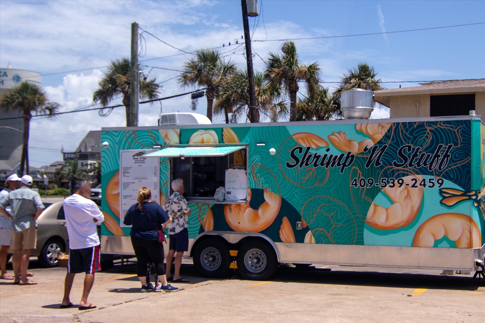A local food truck parked nearby.