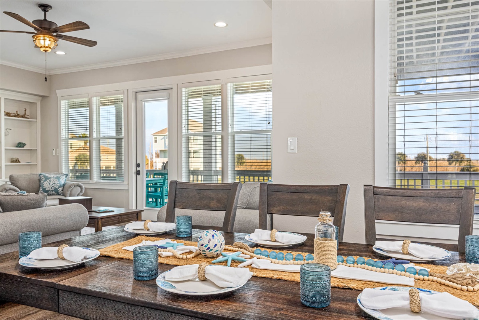 Elegant dining table with coastal place settings.