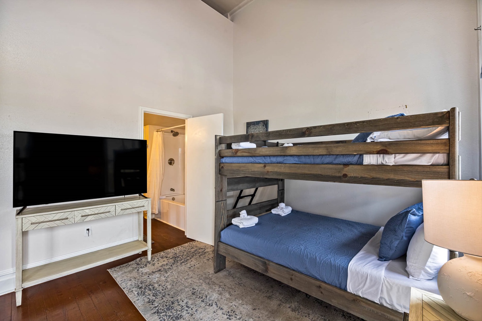 Fun bunk beds with fresh linens and entertainment for kids.