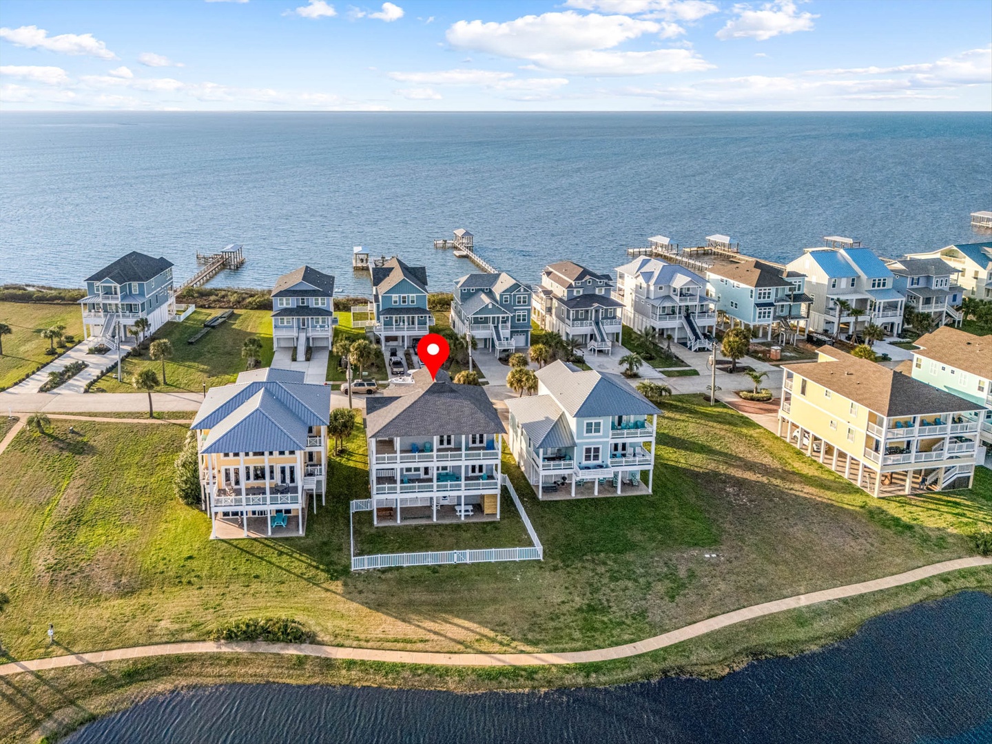 Coastal vacation homes with docks and stunning waterfront views.