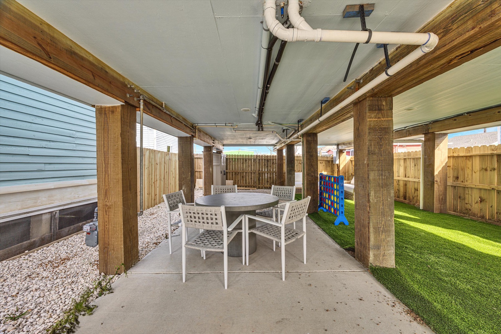 Outdoor dining area perfect for kids, pets, and meals.