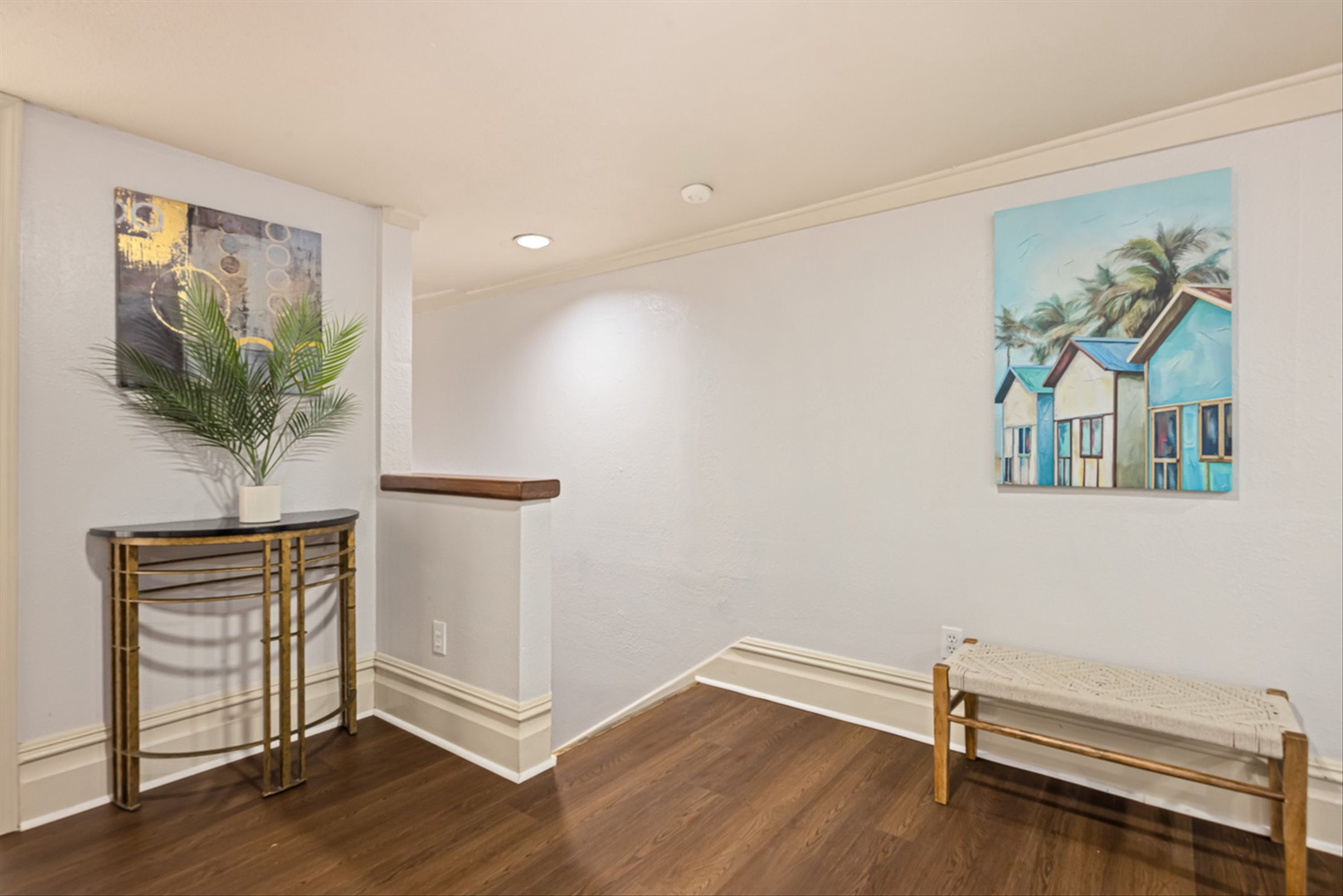 Private retreat with tropical art and sleek, welcoming décor.