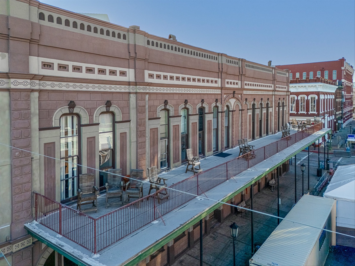 Shared balcony overlooking the Strand for coffee or wine.