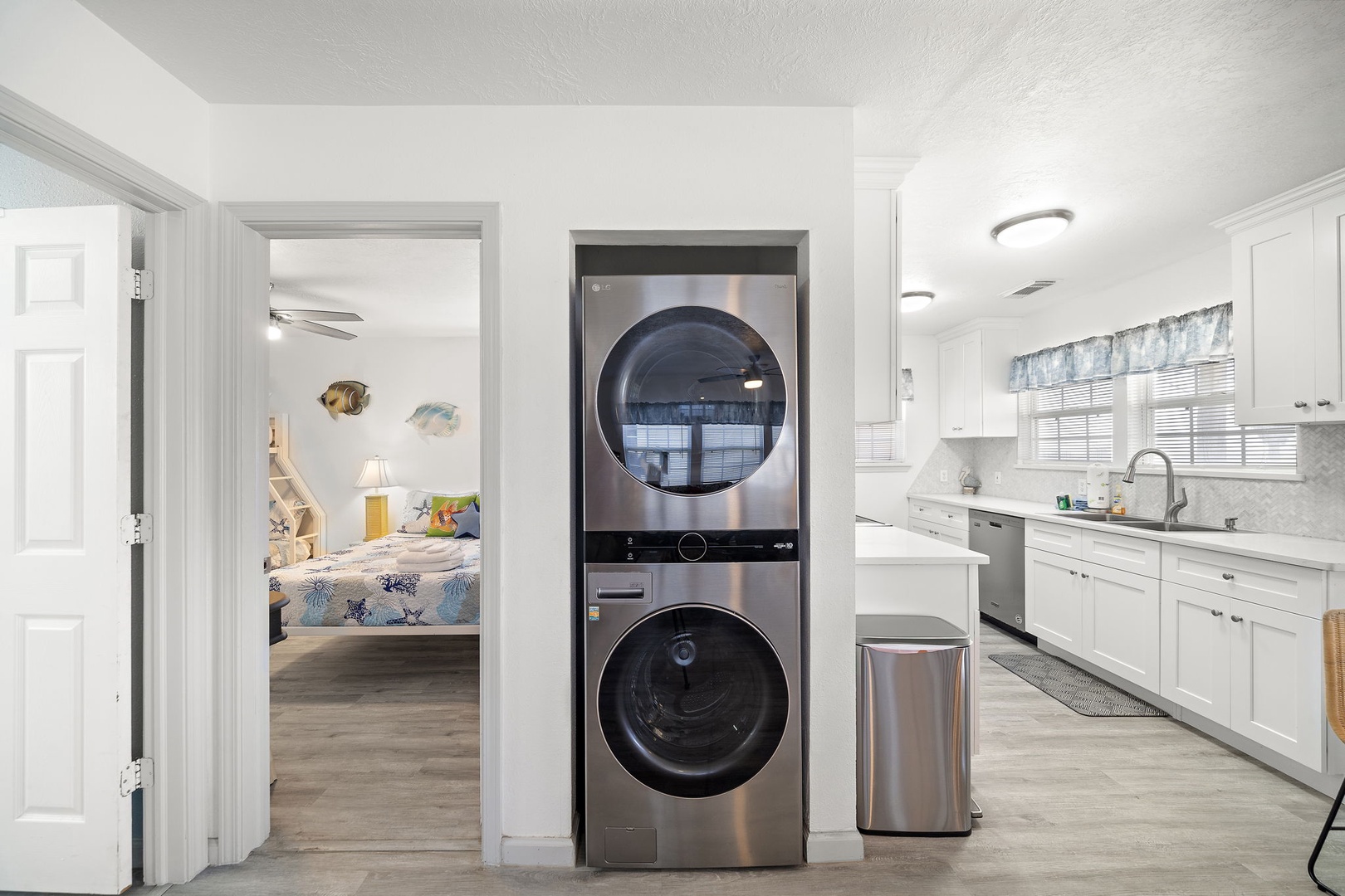Your own convenient laundry nook sits beautifully between your bright, modern kitchen and peaceful bedroom - making it effortless to keep your vacation wardrobe fresh while you relax in style.