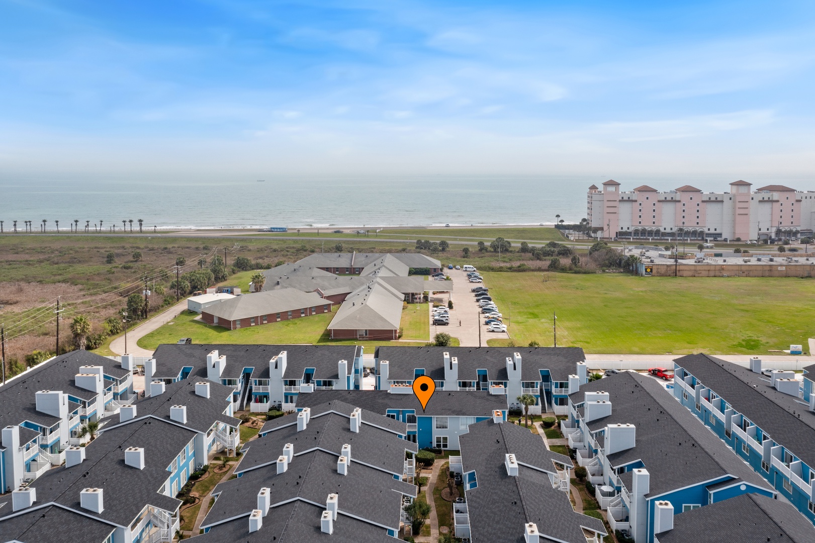 Aerial view of property near beach access