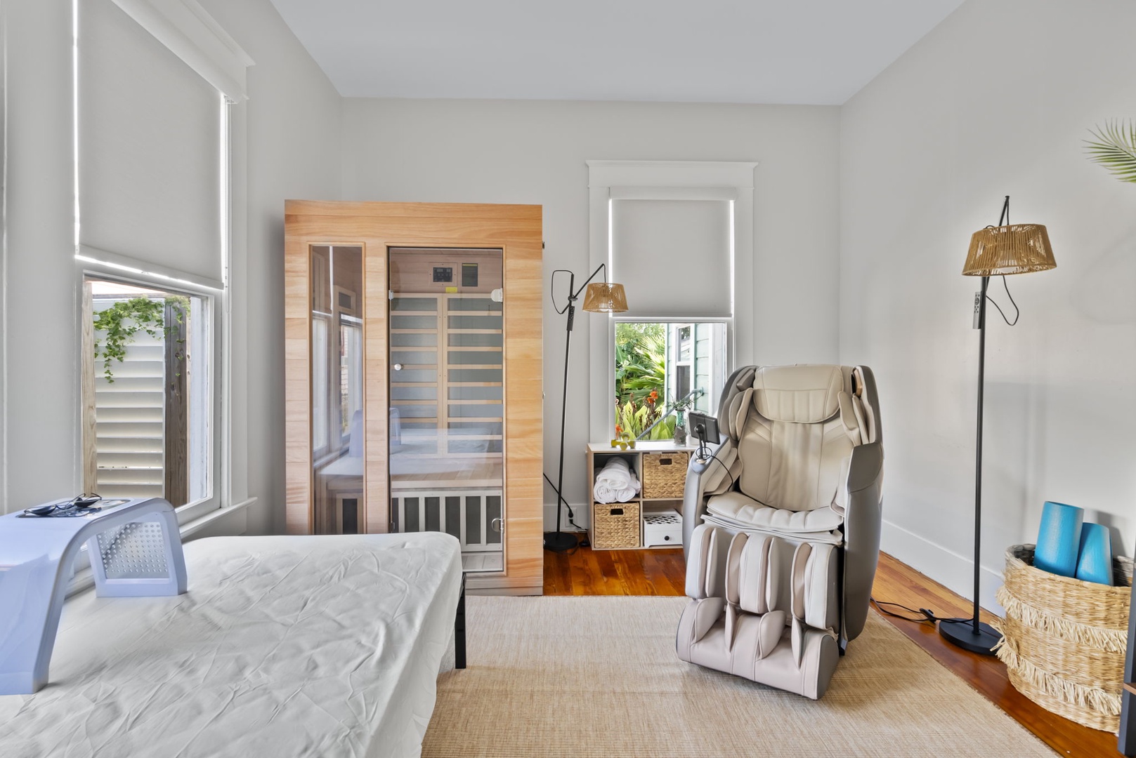 Private wellness retreat with sauna and massage chair.