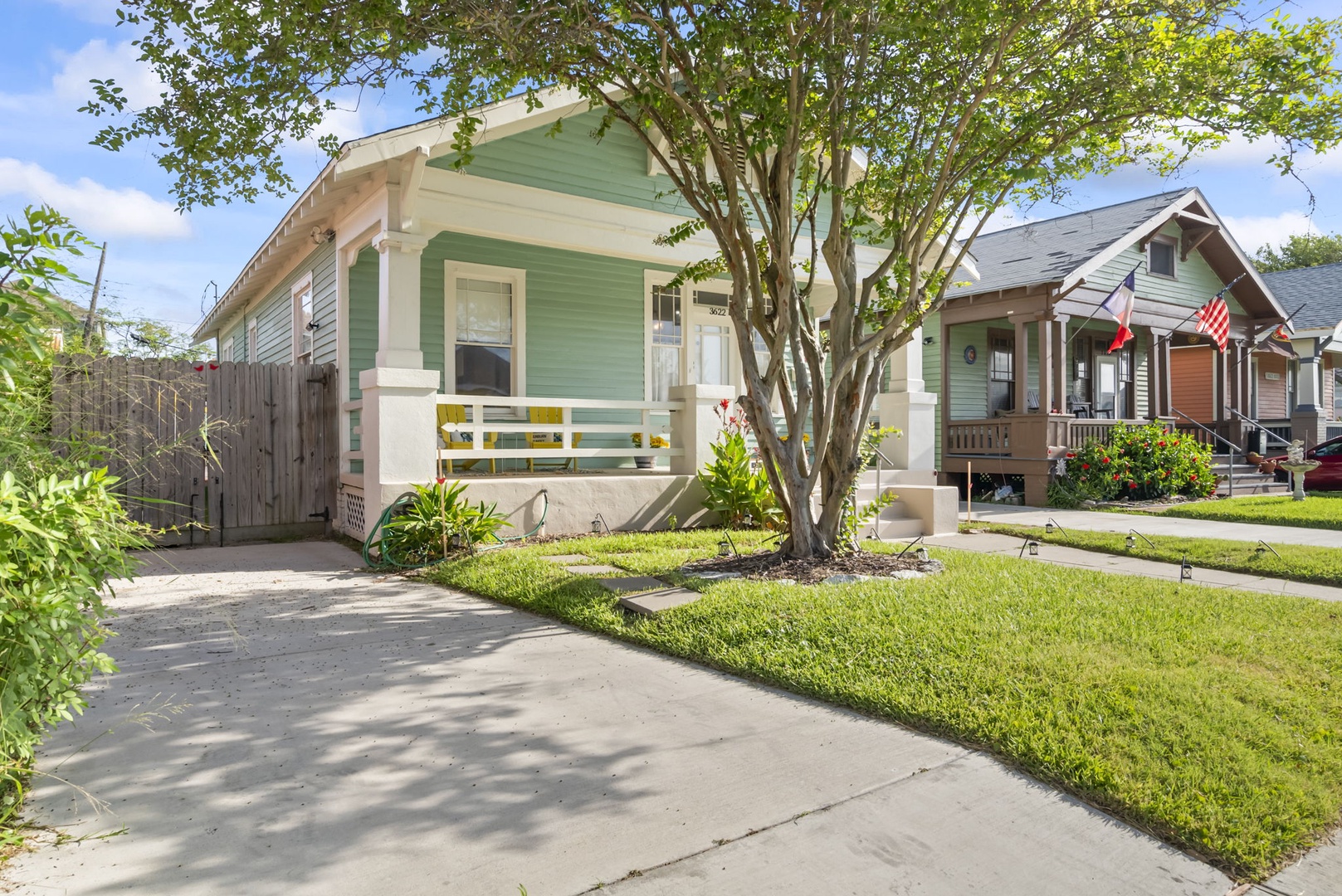 Peaceful cottage with front porch and private driveway.