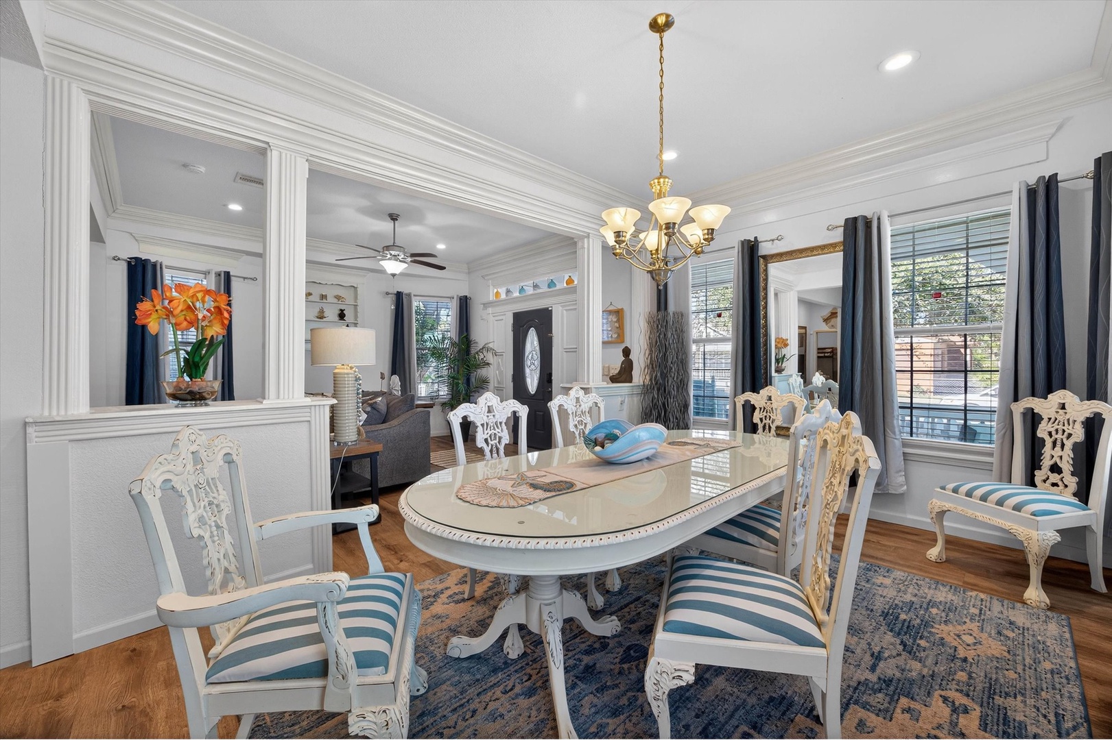 Your elegant dining space features coastal-inspired furnishings and abundant natural light for memorable meals together.