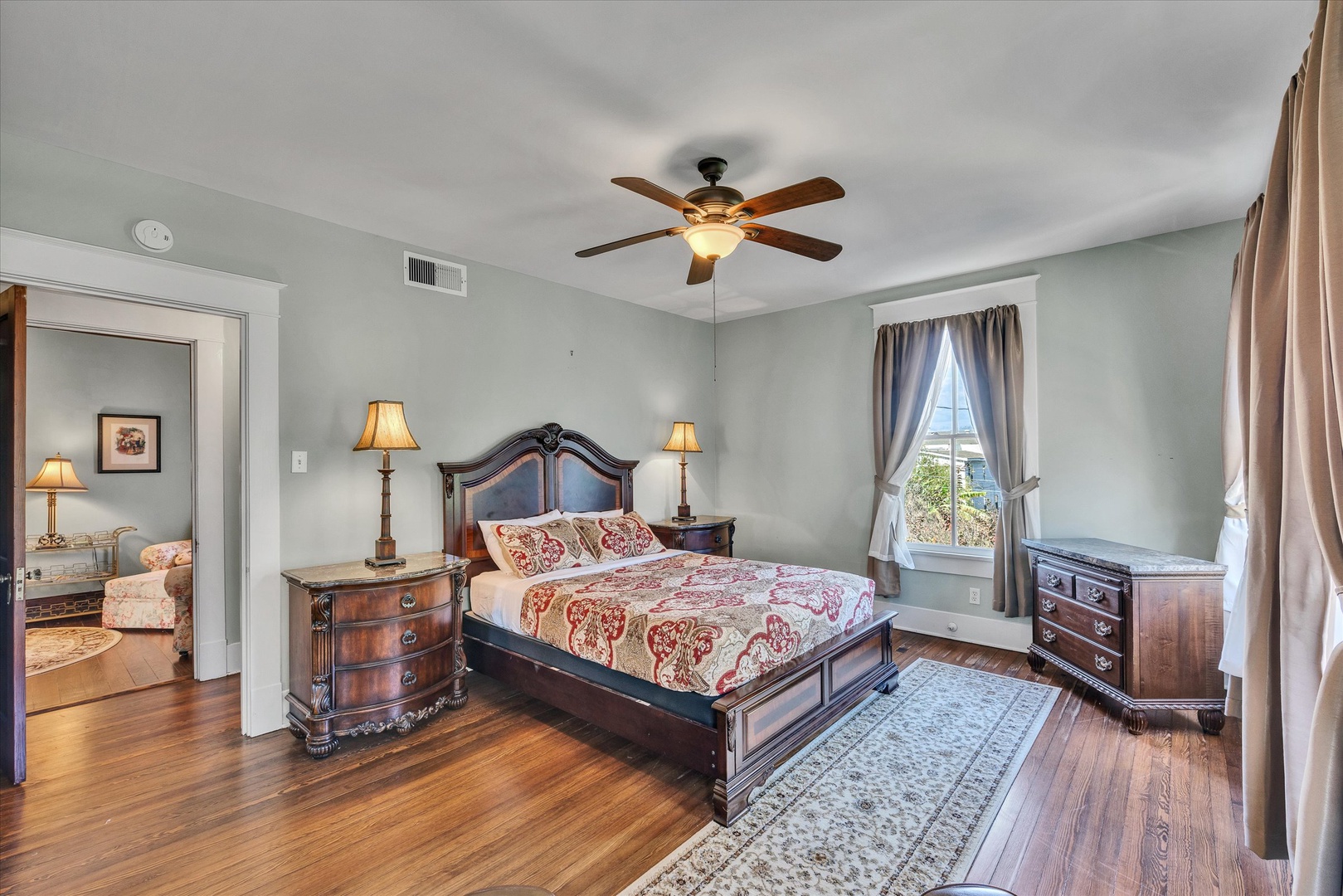 Comfortable queen bed in the upstairs back bedroom