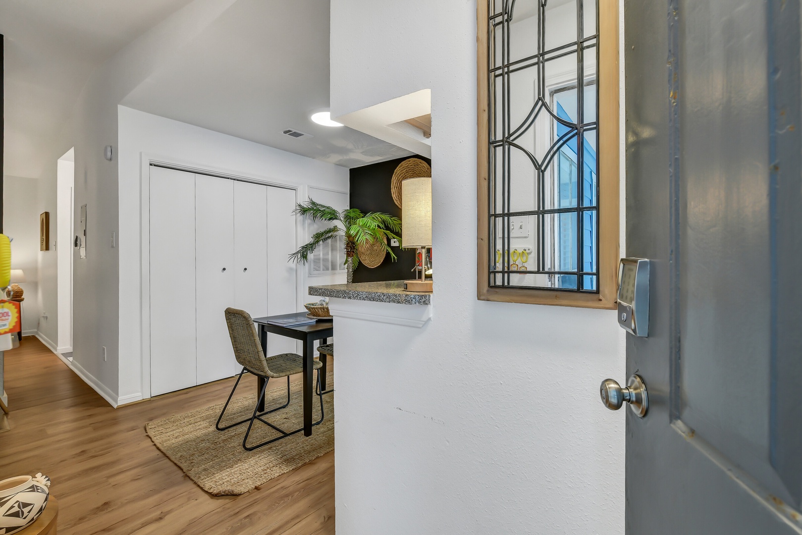 Welcome to a bright retreat with cozy modern details