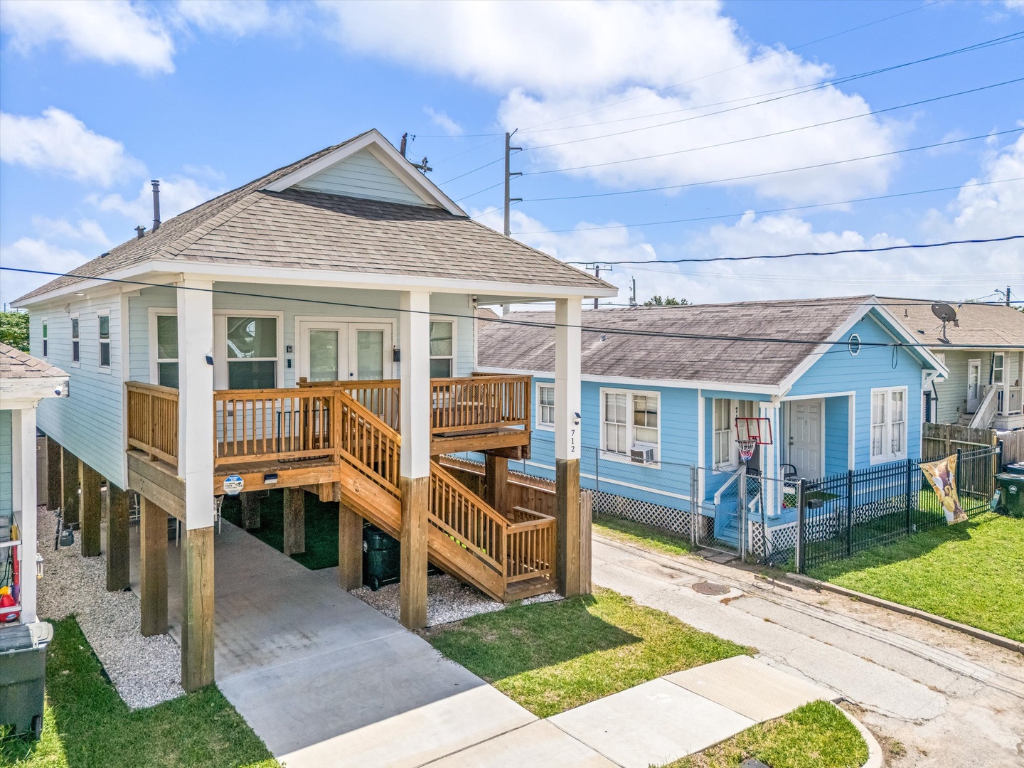 Coastal cottage with porch and easy beach access.