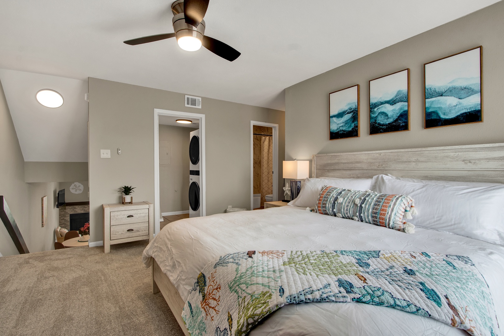 Serene bedroom with in-room laundry for easy stays.