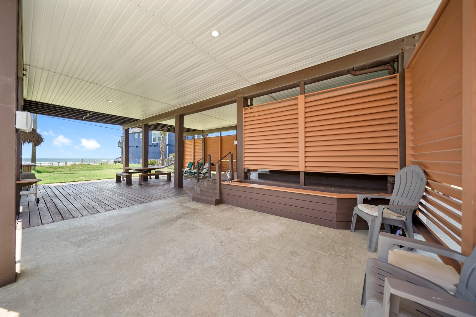Covered patio with beach views and breezes