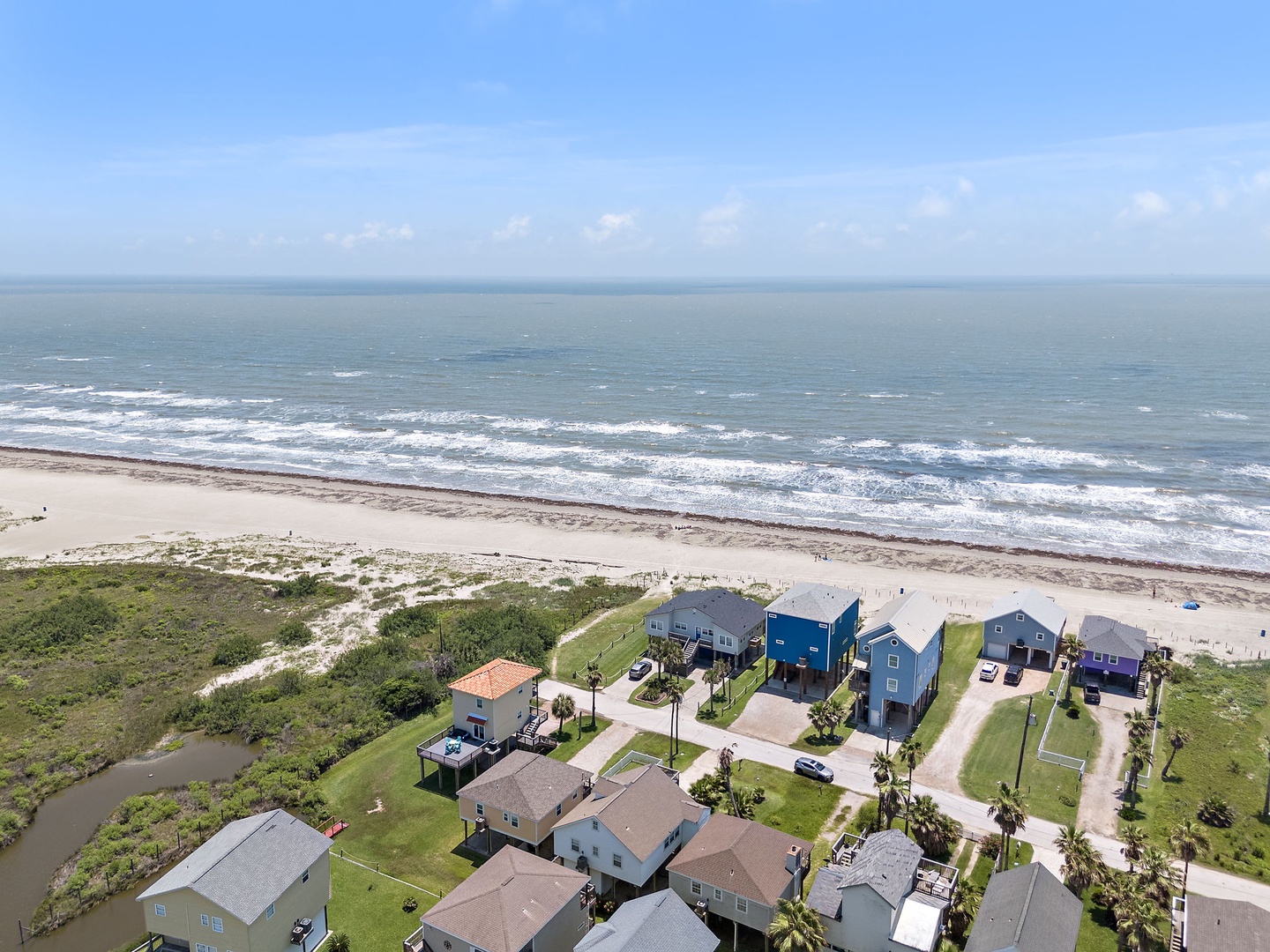 Wake up to endless ocean views and feel the sea breeze from your beach retreat! You're just steps from pristine sand where gentle waves invite morning walks and sunset strolls.