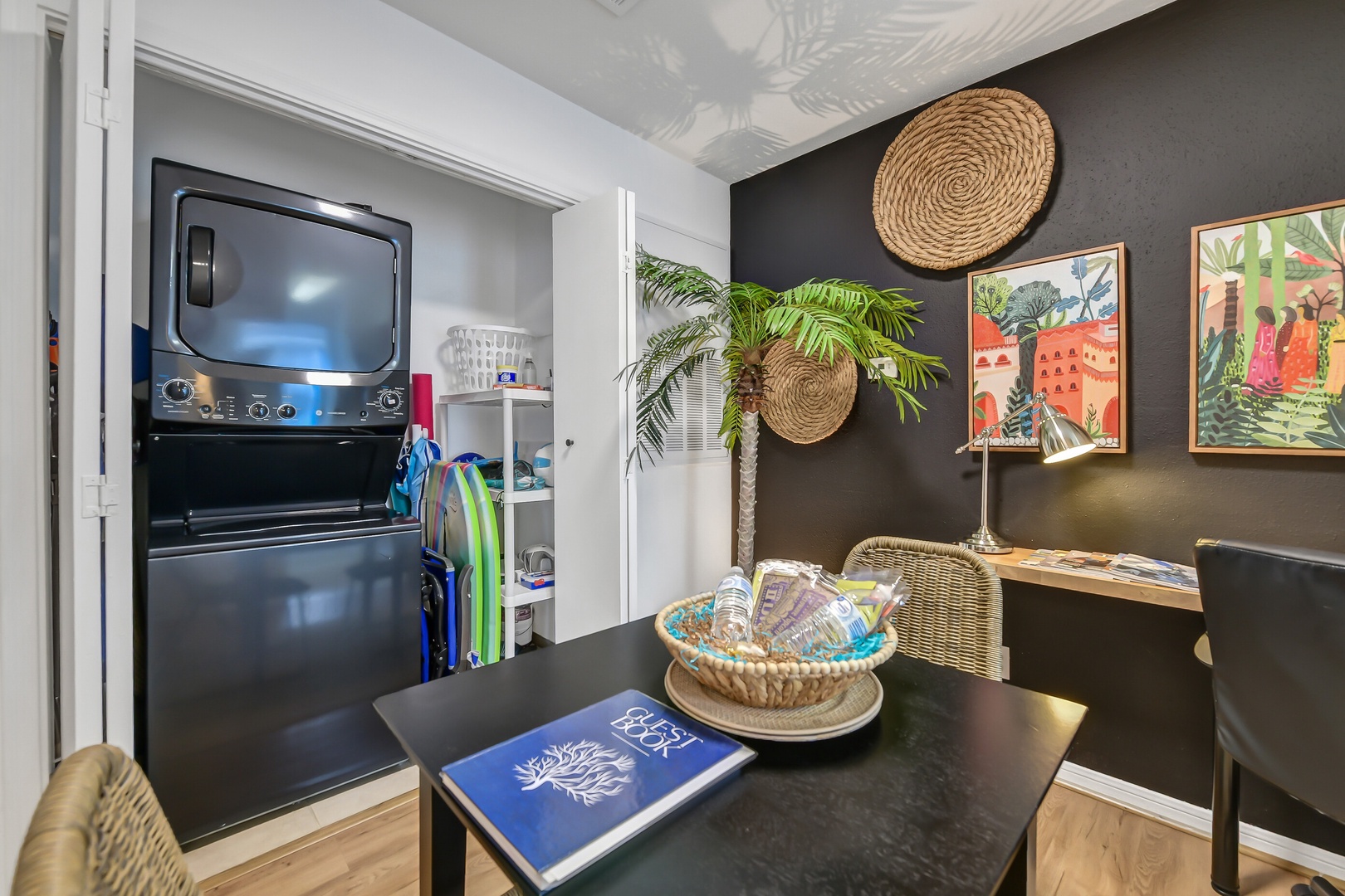 Tropical dining nook with greenery and vibrant artwork