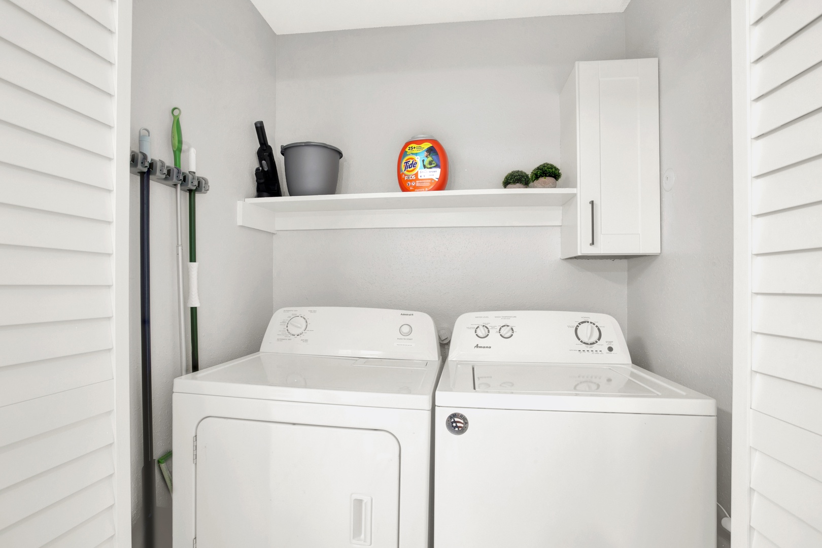 Laundry space with modern washer & dryer
