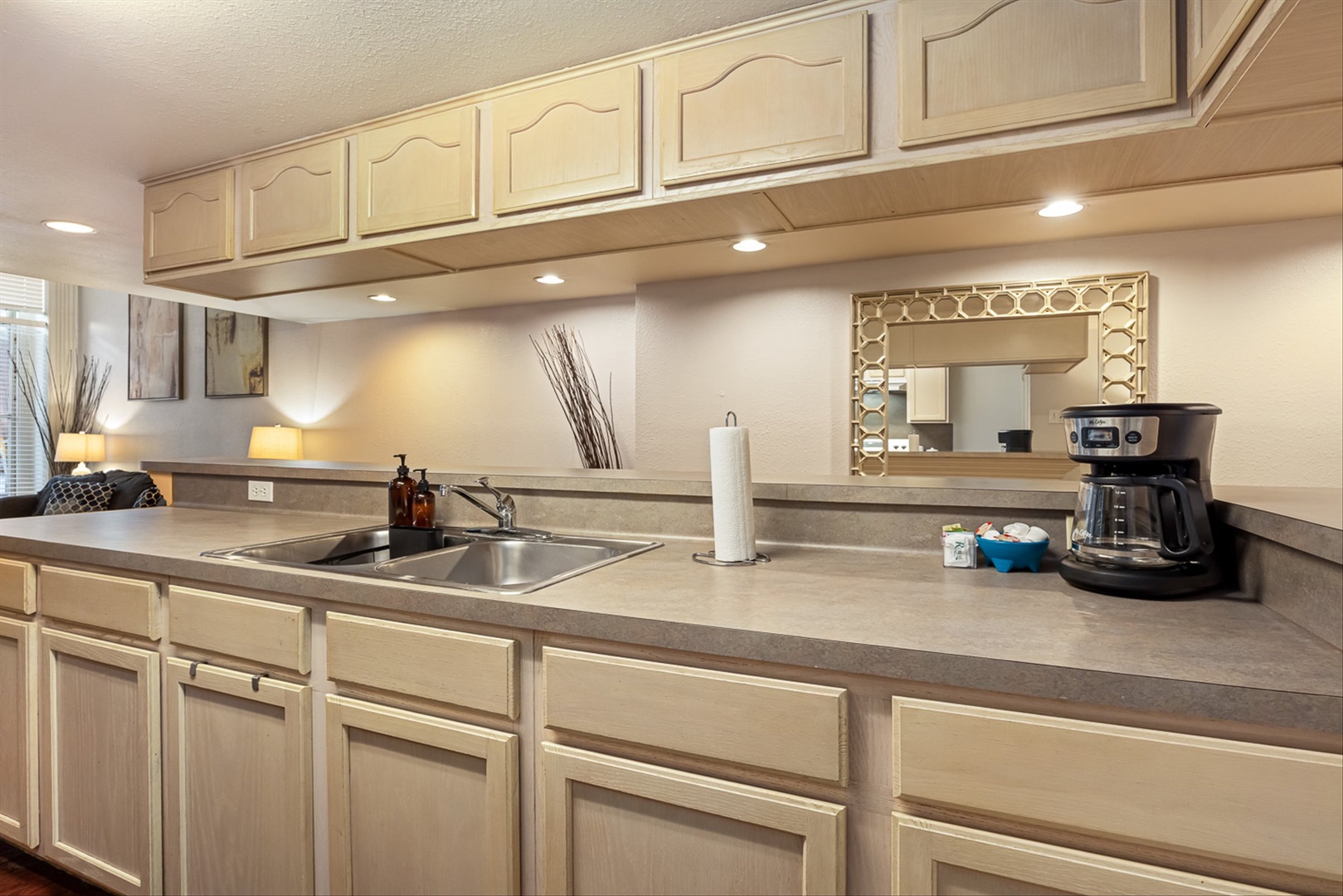 Spacious countertops with double sink for easy meal prep.