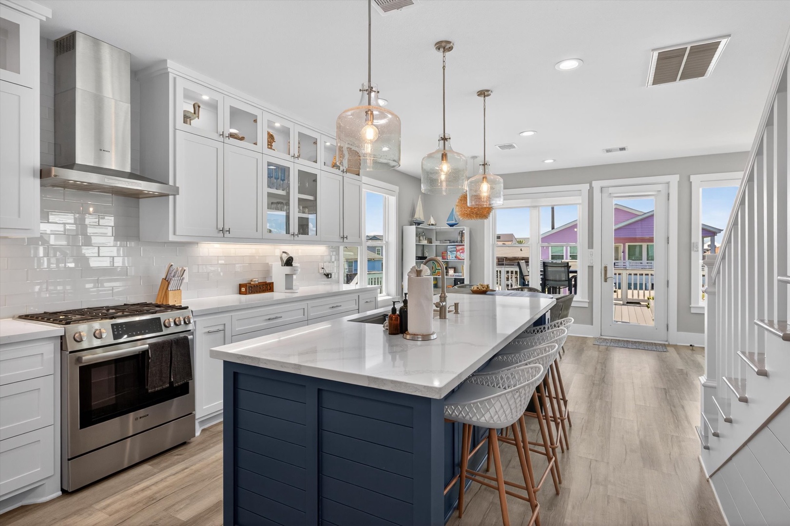 Beautiful kitchen with island and gleaming countertops.