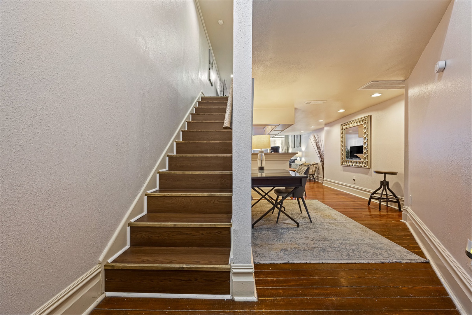 Bright open space with sleek hardwood floors and style.