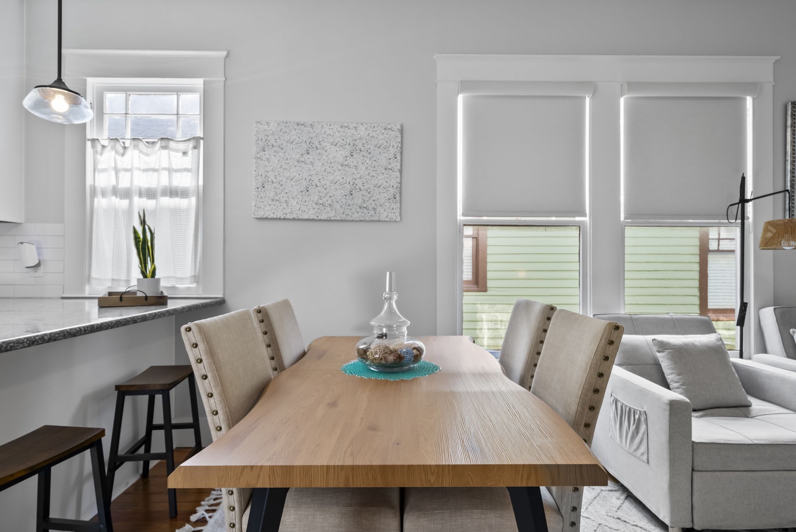Bright dining space with stylish table and natural light.