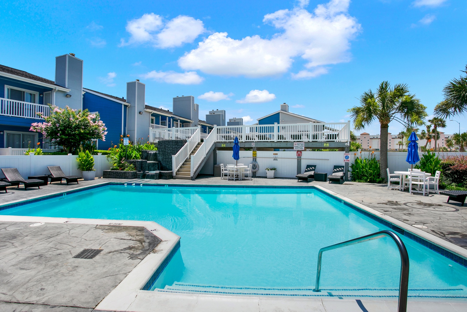 Coastal community pool perfect for relaxing.