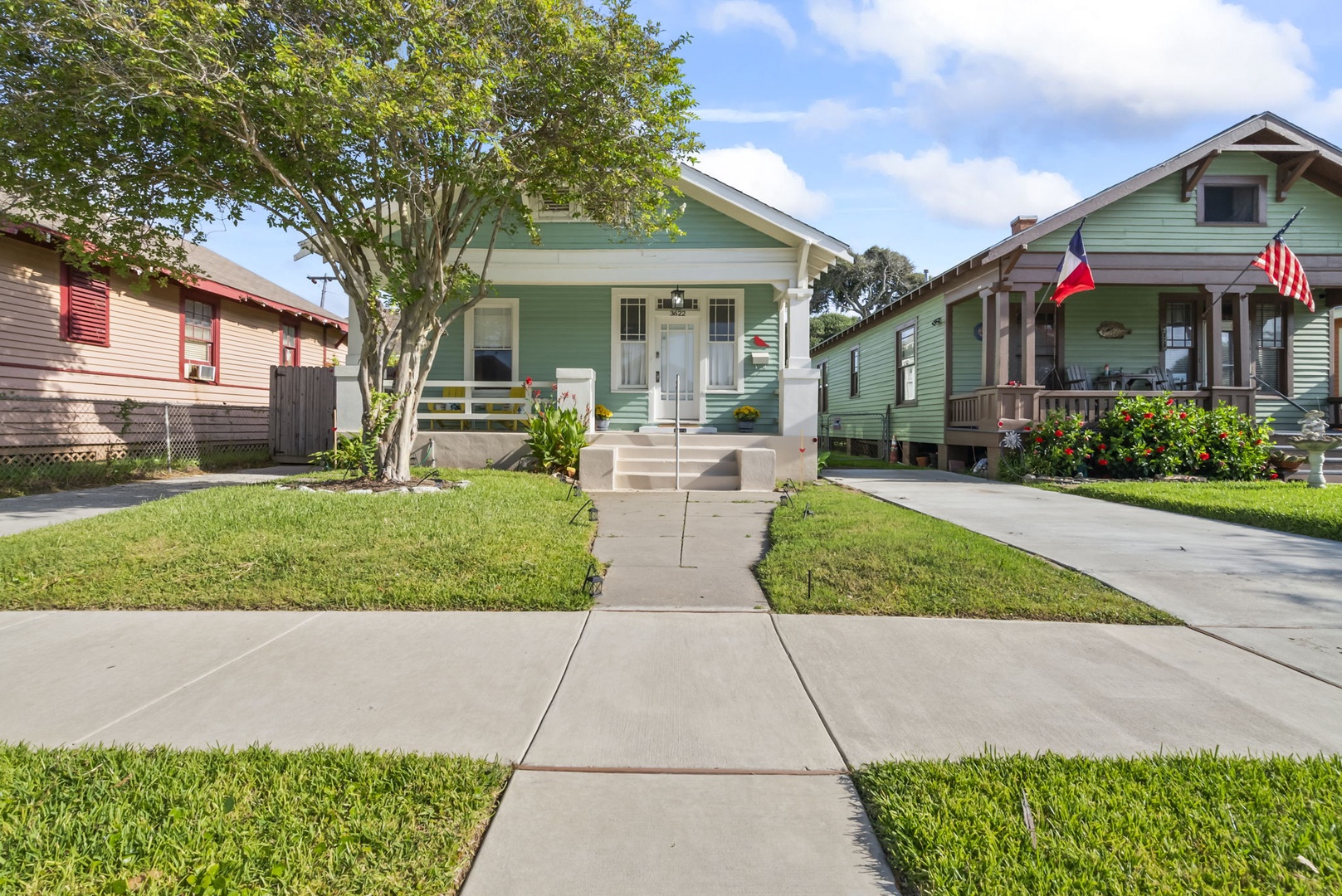 Cottage with porch a few block away from the beach.