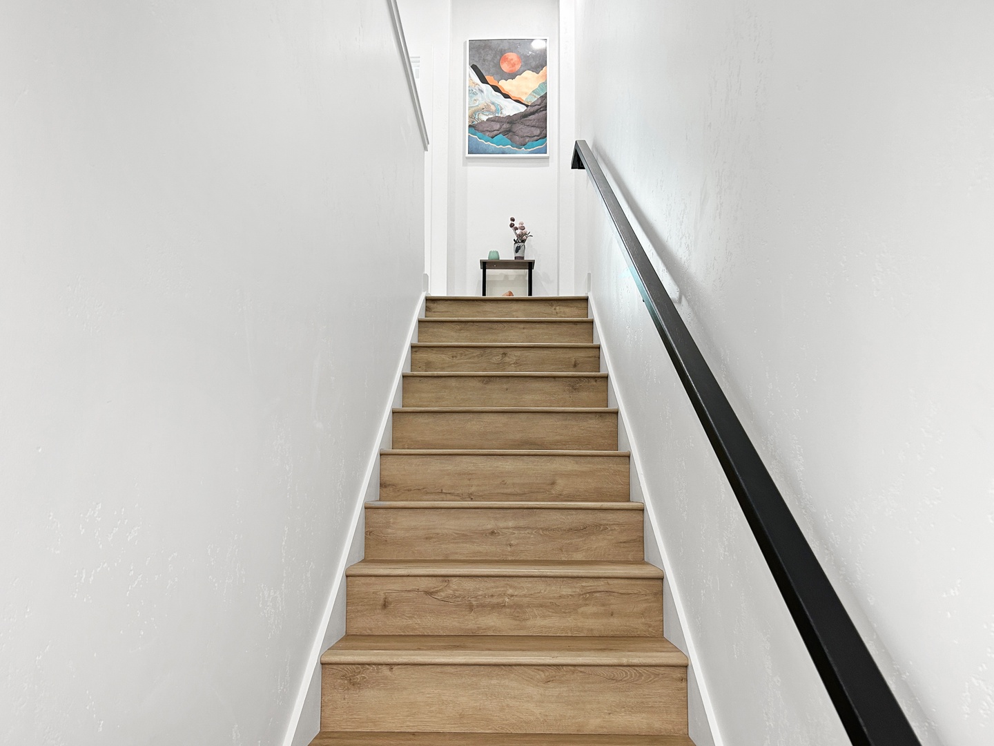 Stairs leading to main two bedrooms upstairs