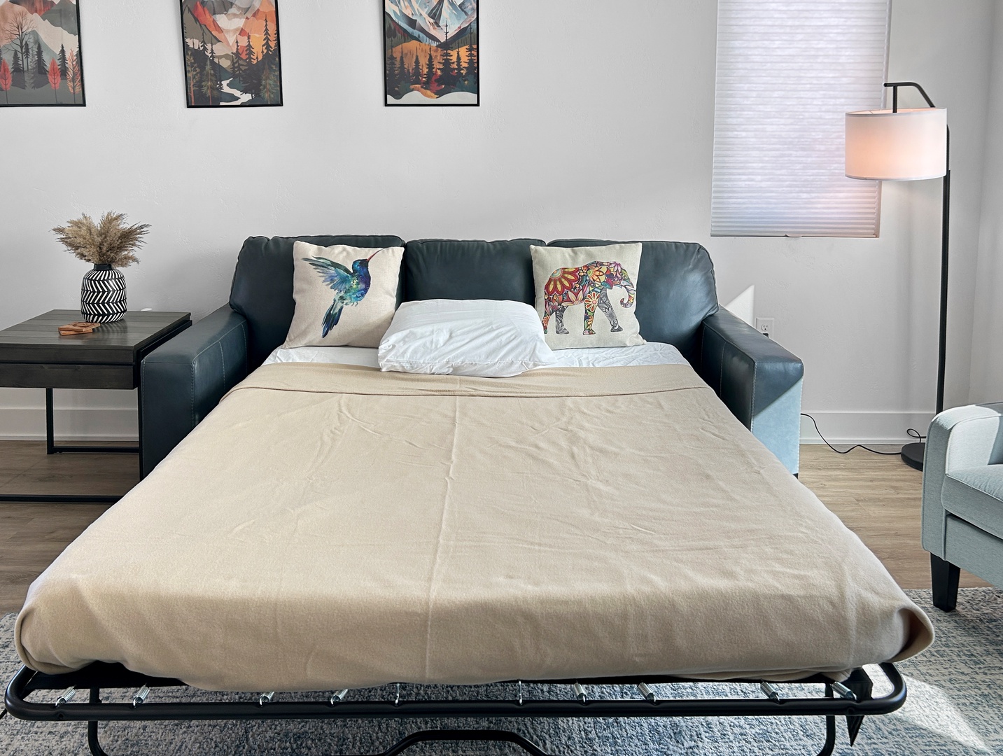 Your comfortable pullout sofa bed offers flexible sleeping arrangements in the stylish living space, perfect for extra guests or cozy movie nights.