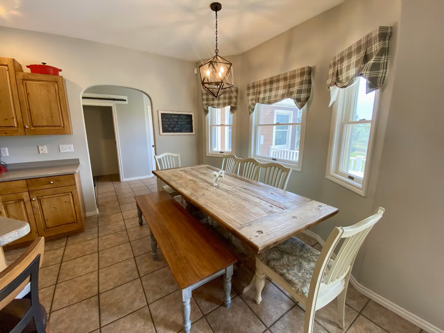 Inviting farmhouse-style dining table to share a meal and lasting memories.