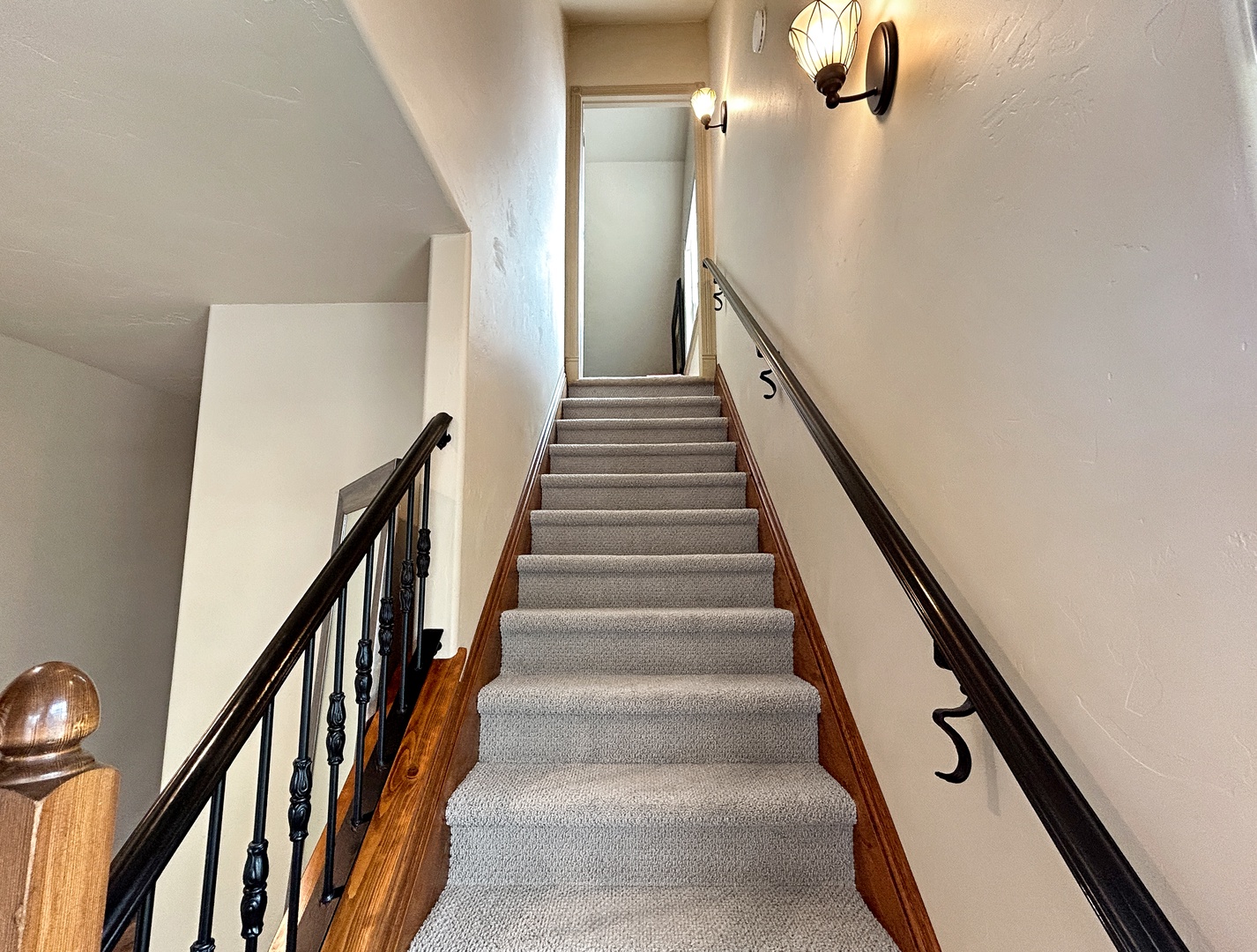 Stairs that lead to third floor bedroom