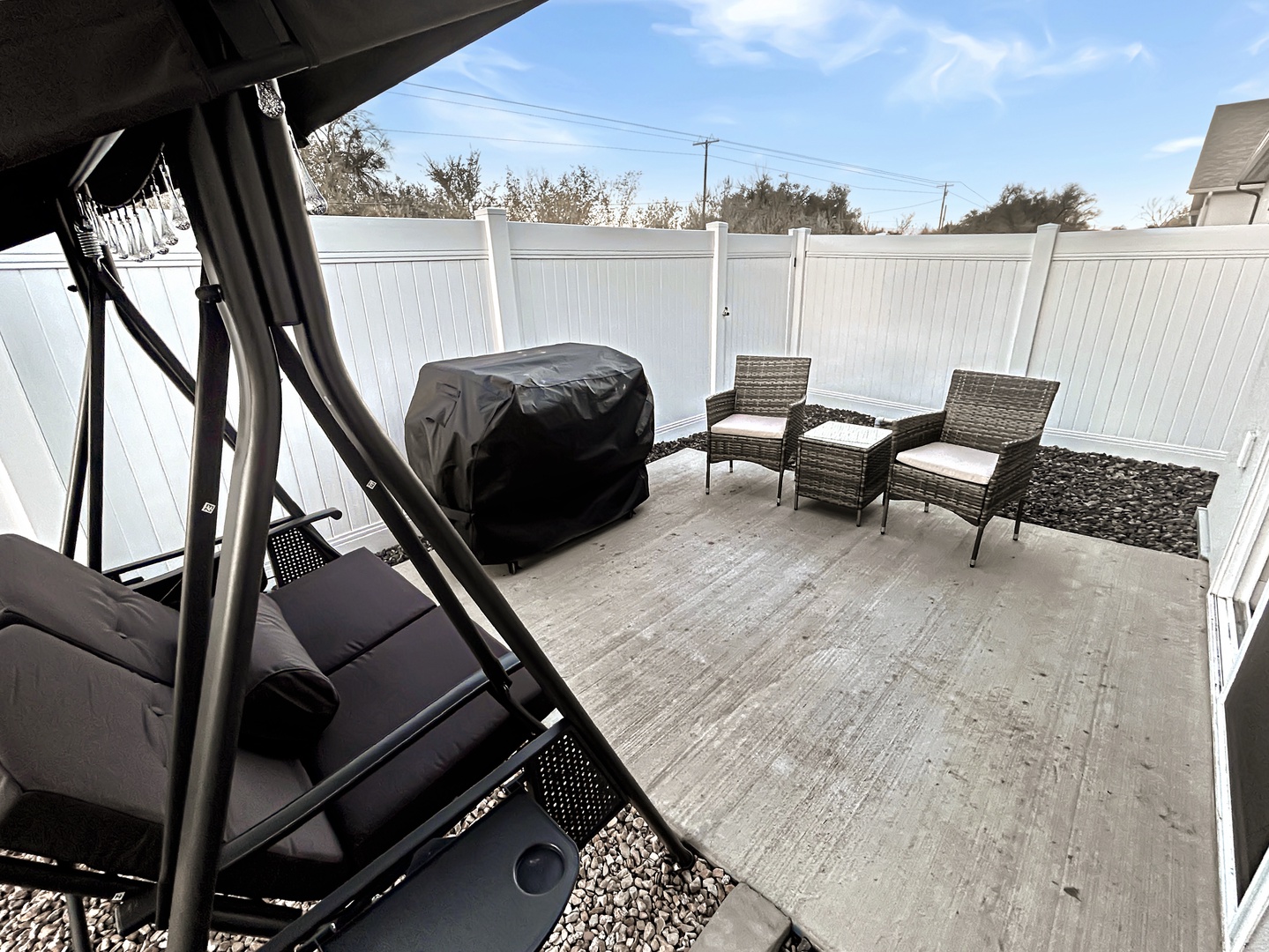 Flat top gas grill and comfy swing chair