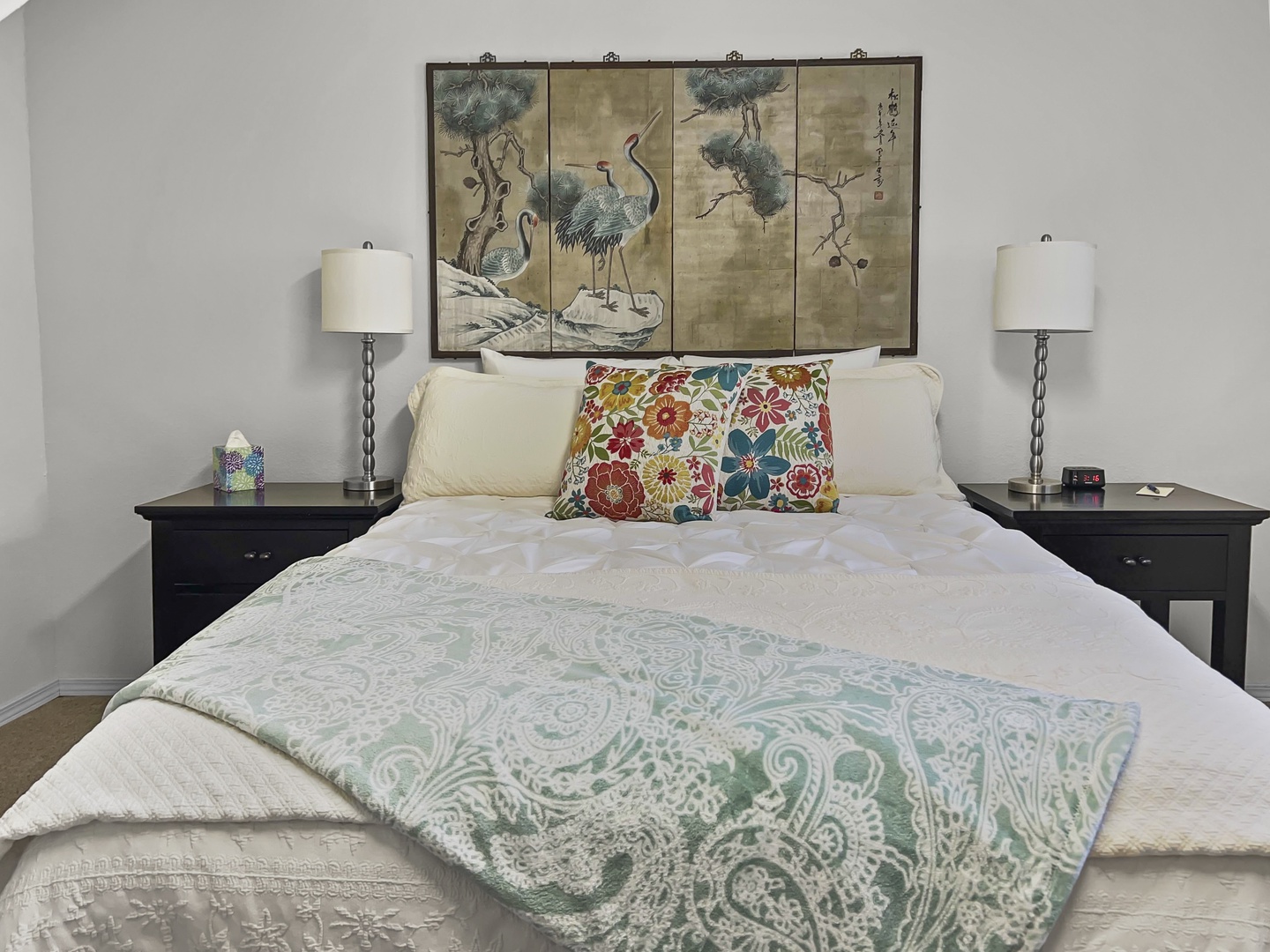 Downstairs bedroom with queen bed