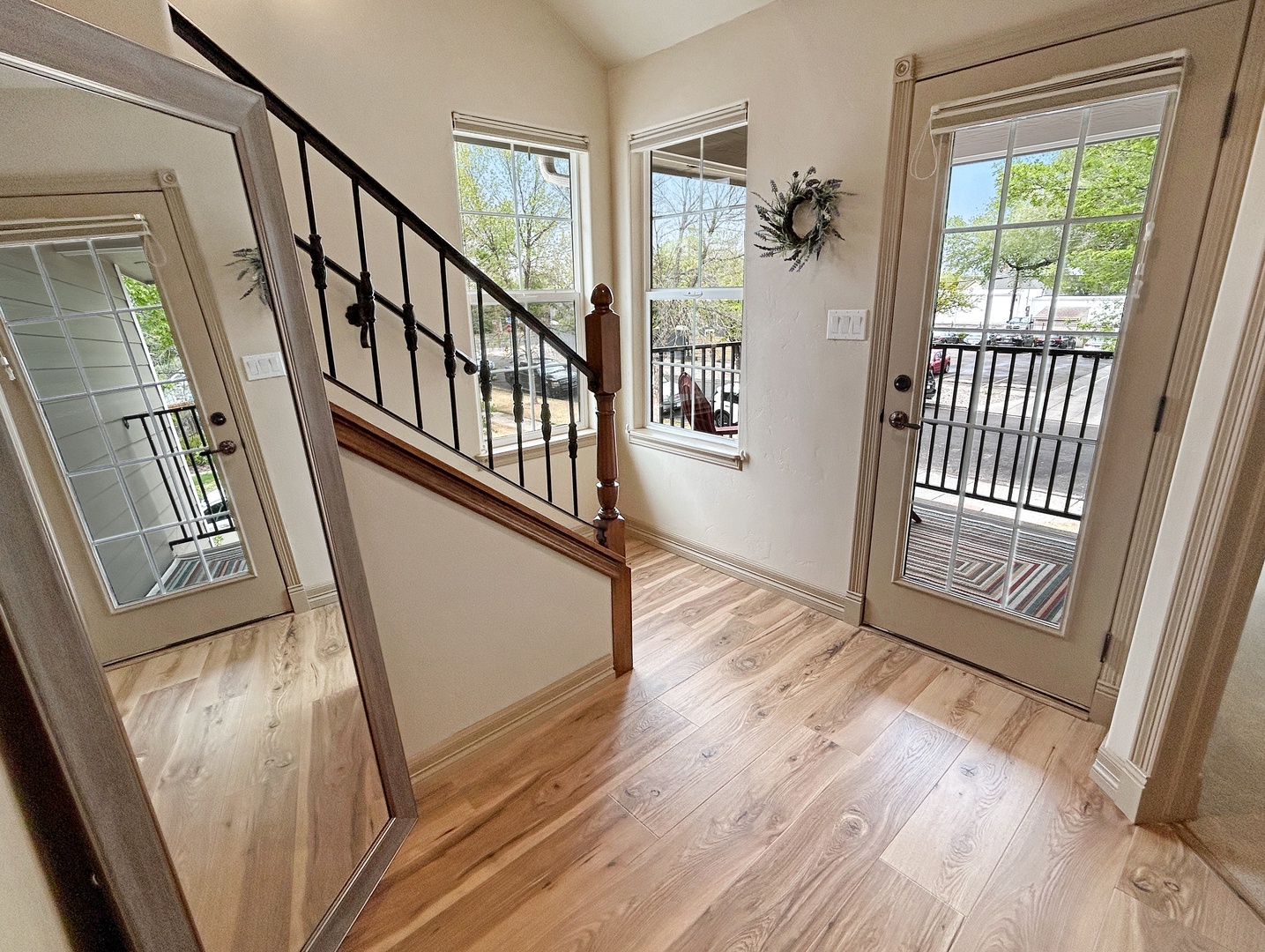 Landing on second floor with access to balcony.