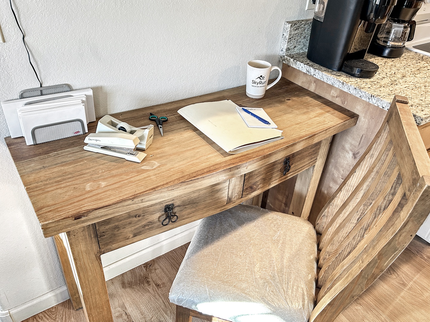 Your dedicated workspace awaits. Complete with coffee maker nearby for productive mornings and focused work sessions.