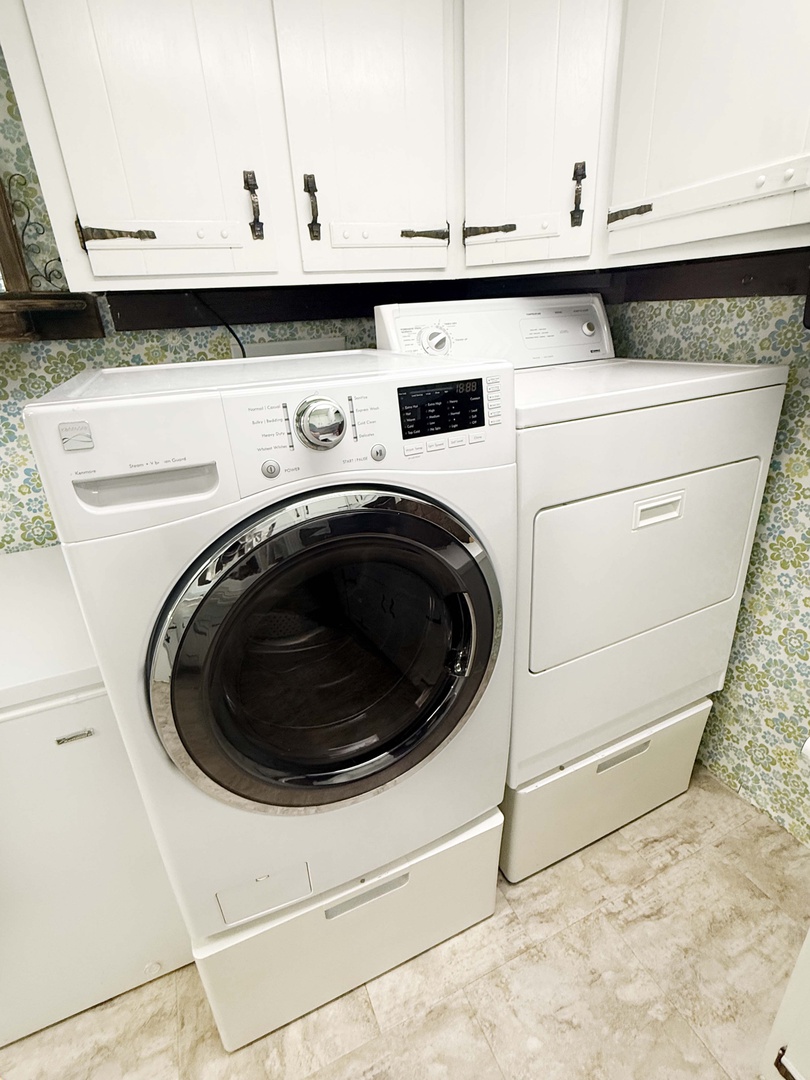Your private laundry room is stocked with a full-size washer and dryer, plus storage.