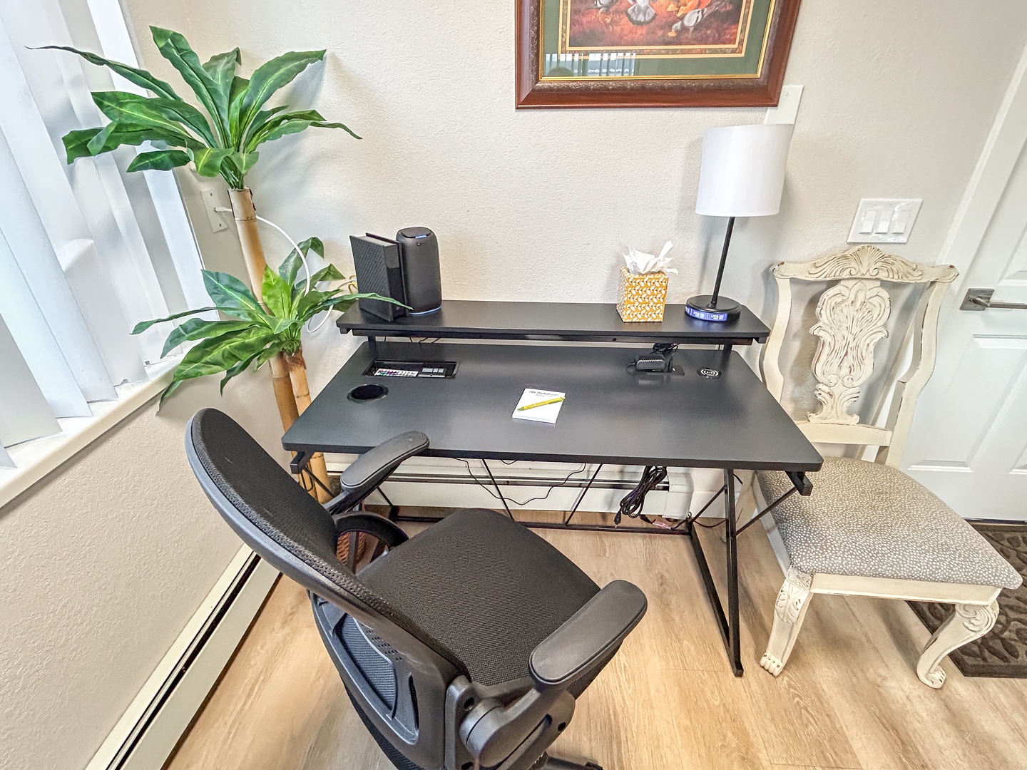 Your dedicated workspace awaits with a modern desk, ergonomic chair, and thoughtful details to keep you productive during your stay.