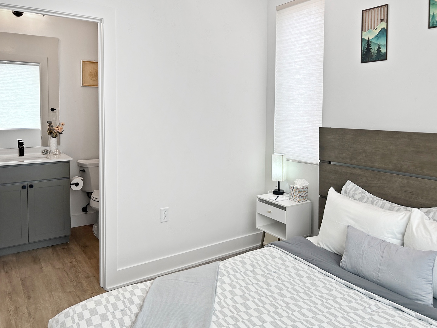 Second bedroom upstairs with private en suite full bathroom.